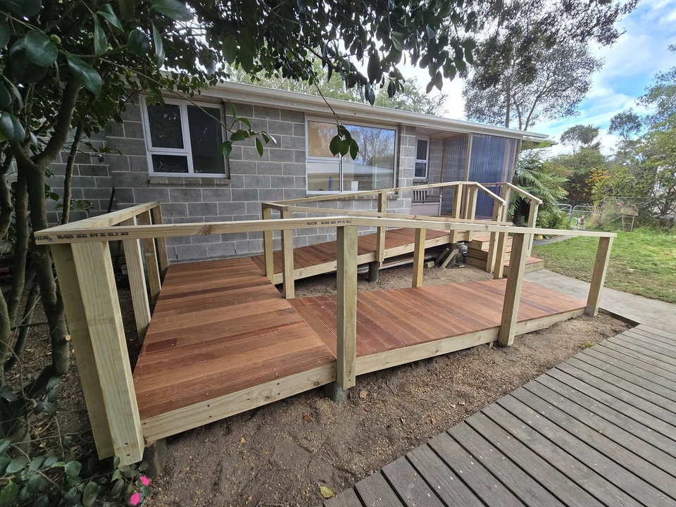 After: the new timber deck and balustrade built over that spot